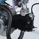 Illustration for article titled This Is What Happens When You Turn A Honda Super Cub Into A Badass Racer